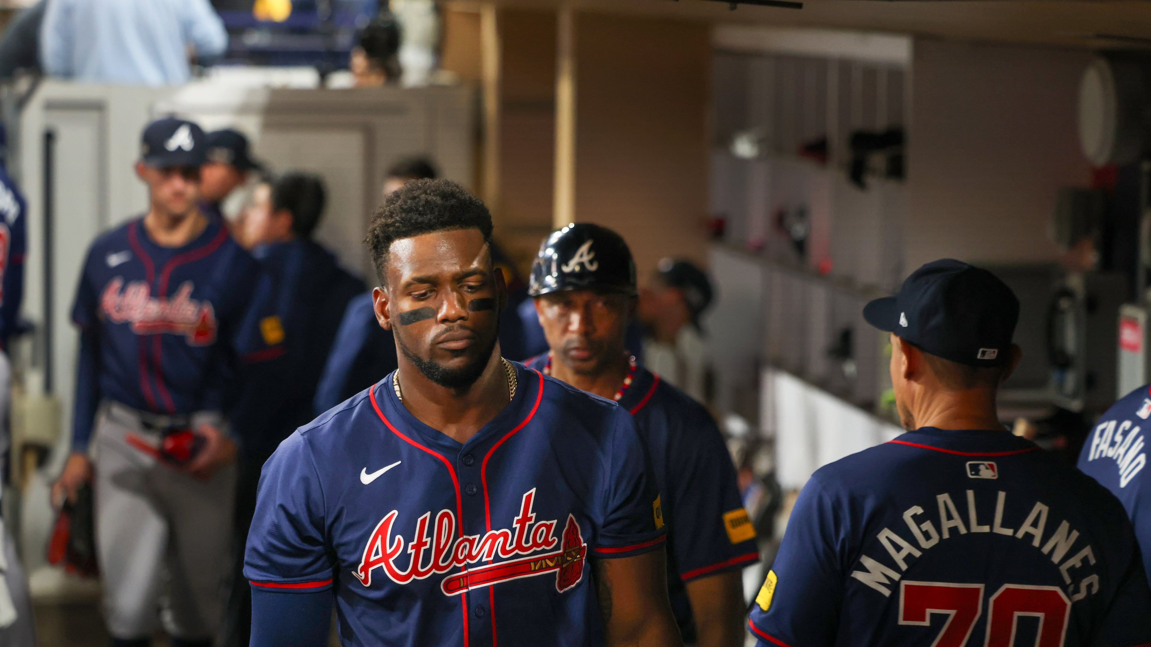 In this file photo from October 2024, Atlanta Braves outfielder Jorge Soler and teammates react after losing to the San Diego Padres 5-4 in San Diego. The Braves and Soler, who now plays for the Los Angeles Lakers, face a lawsuit by a fan injured at a 2021 World Series game at Truist Park in Atlanta. (Jason Getz/AJC)