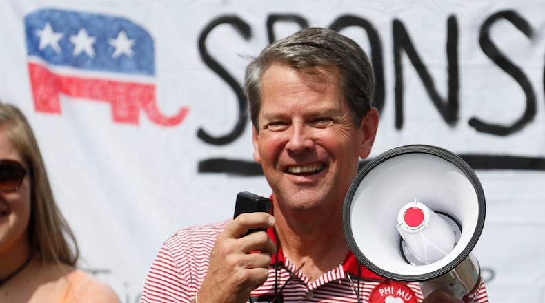9/29/18 - Athens - Brian Kemp, Republican candidate for Governor, campaigns at a young Republicans tailgate party.  The University of Georgia's football season has attracted candidates. Brian Kemp invokes the team seemingly every chance he gets, with constant talk of "chopping wood" and other slogans from coach Kirby Smart.  Democrat John Barrow gets in on the action, too, holding tailgates from his Athens home.  BOB ANDRES  /BANDRES@AJC.COM