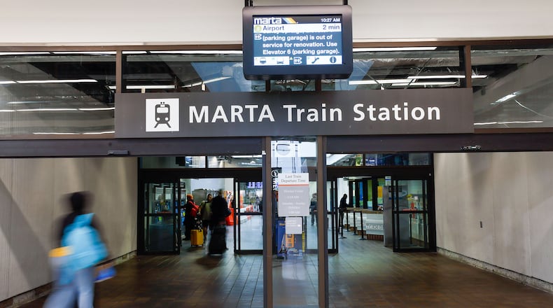 Passengers and travelers entering the MARTA station at Hartsfield-Jackson Atlanta International Airport on Feb. 27. (Miguel Martinez/The Atlanta Journal-Constitution)