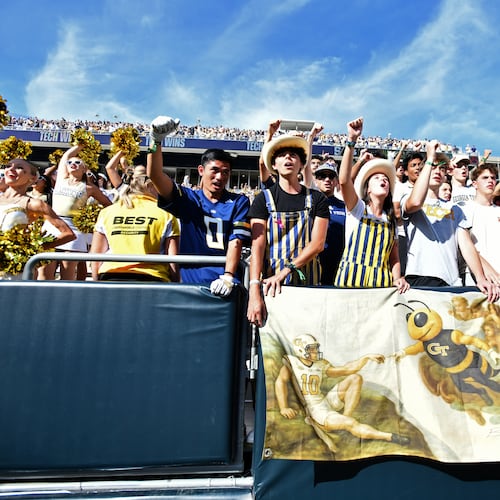 Georgia Tech fans celebrate after Georgia Tech beat Syracuse during an NCAA college football game at Bobby Dodd Stadium, Saturday, October 25, 2025 in Atlanta. Georgia Tech won 41-16 over Syracuse. The Yellow Jackets are 8-0 for the first time since 1966 and 5-0 in the ACC for the first time ever. (Hyosub Shin / AJC)
