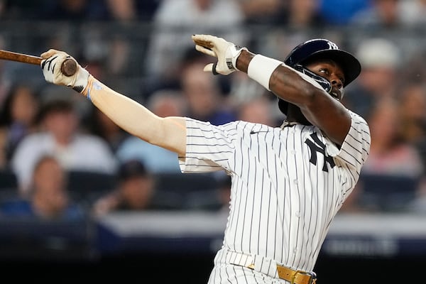New York Yankees' Jazz Chisholm Jr. (13) hits home run during the fifth inning of a baseball game against the Seattle Mariners, Wednesday, July 9, 2025, in New York. (AP Photo/Yuki Iwamura)