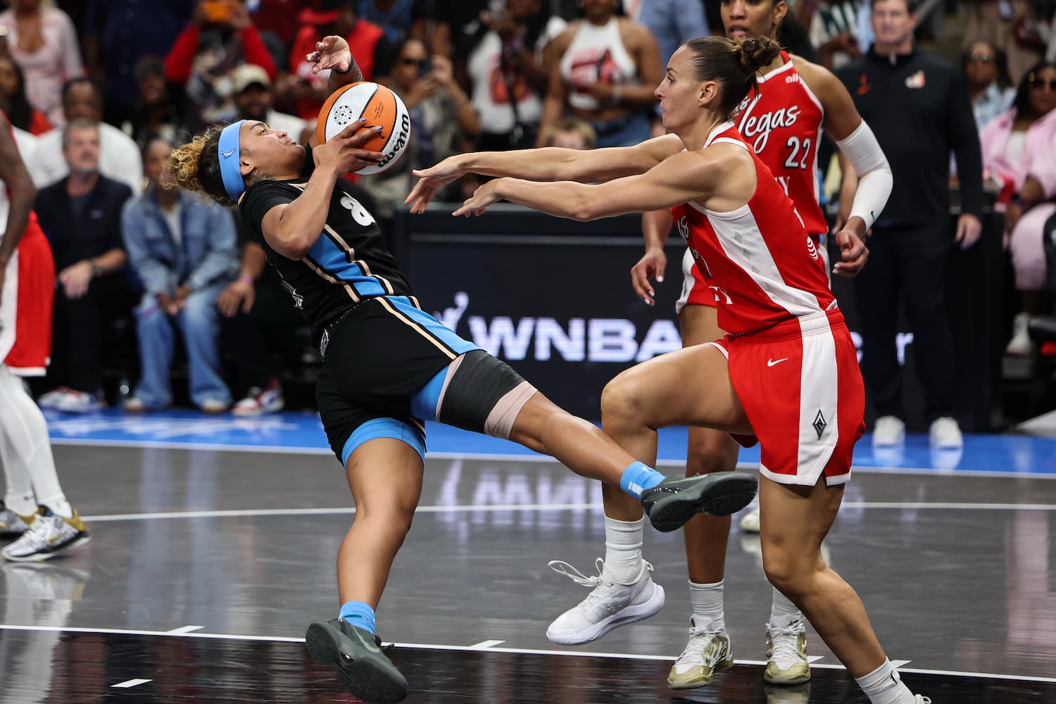 Atlanta Dream guard Te-Hina Paopao, left, loses the ball against Las Vegas Aces forward Stephanie Talbot, right, during the second half of a WNBA game at State Farm Arena on Sunday, May 17, 2026, in Atlanta. (Colin Hubbard for the AJC) 