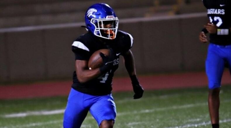 Senior Stephenson running back Devin Ingram ran for 255 yards and three touchdowns and added a 90-yard kickoff return for a score to lead the Jaguars to a 49-24 Region 6-4A win over the Miller Grove Wolverines on Oct. 12, 2023. (Photo by Mark Brock)