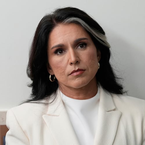 FILE - Director of National Intelligence Tulsi Gabbard sits in the James Brady Press Briefing Room at the White House, July 23, 2025, in Washington. (AP Photo/Alex Brandon, File)