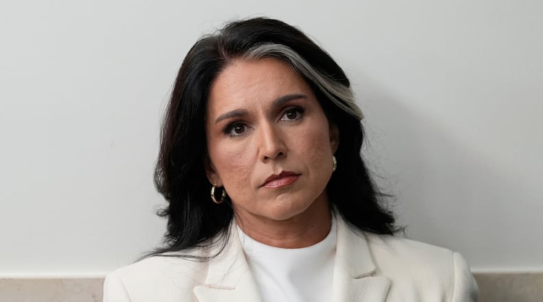 FILE - Director of National Intelligence Tulsi Gabbard sits in the James Brady Press Briefing Room at the White House, July 23, 2025, in Washington. (AP Photo/Alex Brandon, File)