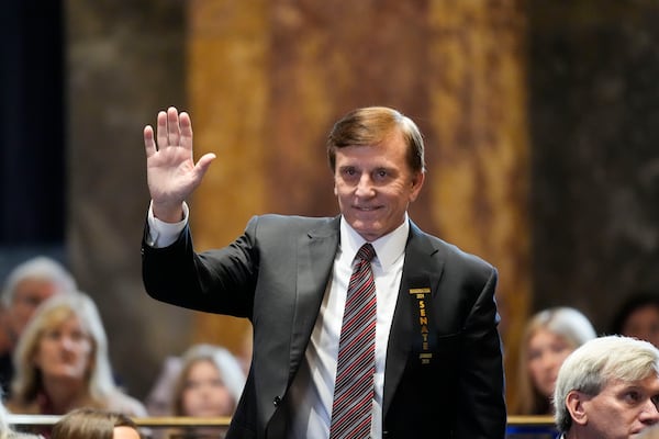 FILE - Louisiana State Treasurer John Fleming, waves as he is introduced during the swearing in of the Louisiana state legislature in Baton Rouge, La., Jan. 8, 2024. (AP Photo/Gerald Herbert, Pool, File)