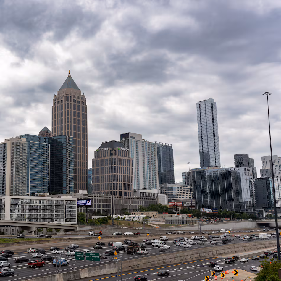 Rain clouds are expected to roll into Middle and North Georgia, as they did pictured here in Atlanta on May 6. The National Weather Service warns of “damaging winds, large hail, frequent lightning, and locally heavy rain" on Sunday afternoon and night. (Ben Hendren for the AJC)