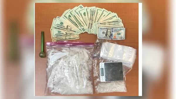 Investigators seized methamphetamine worth $61,400 and cash from a Hall County home Wednesdasy.