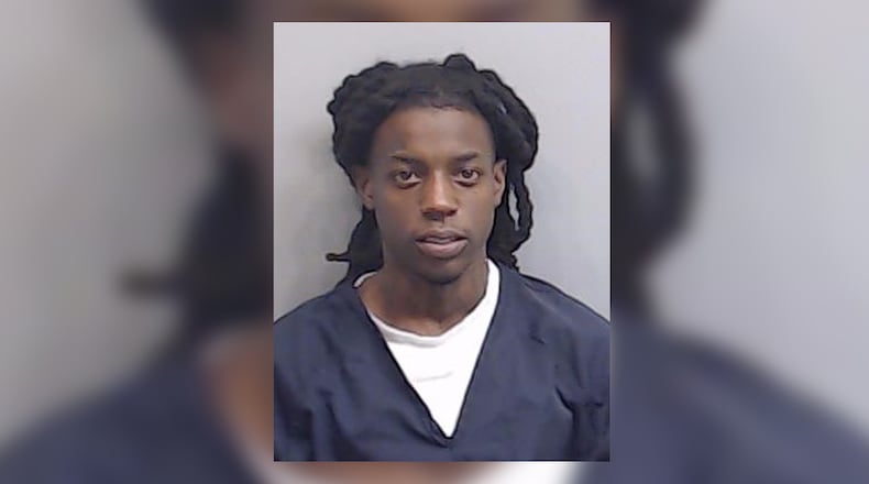 LeParis Dade, 24, also known as OMB Peezy, was booked into the Fulton County Jail on charges of aggravated assault with a deadly weapon and possession of a firearm during the commission of a crime.