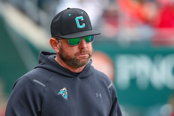 FILE - Coastal Carolina head coach Kevin Schnall walks onto the field during an NCAA baseball game against Ohio State in Jacksonville, Fla., Feb. 22, 2025. (AP Photo/Gary McCullough, file)