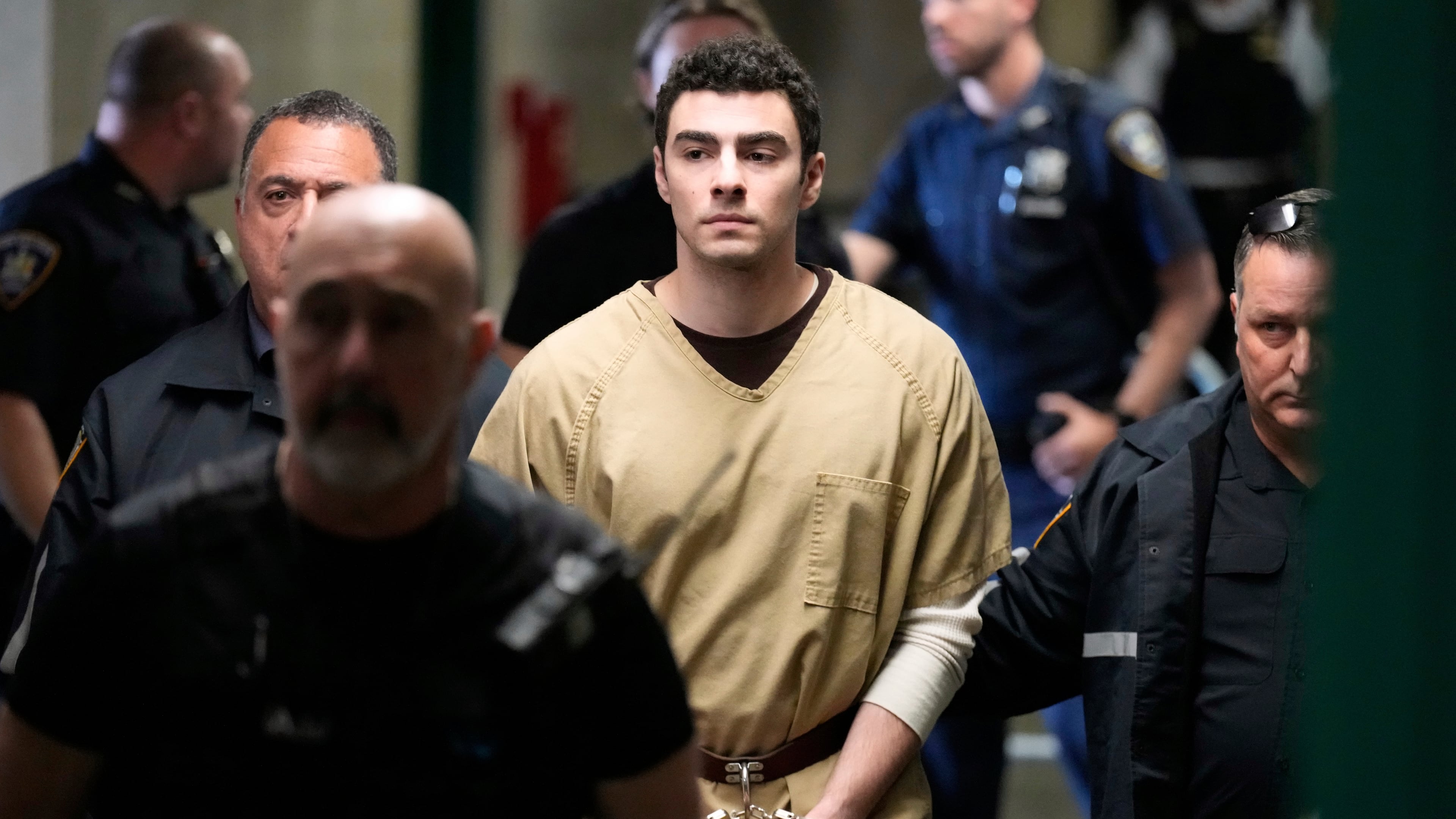 Luigi Mangione is escorted into Manhattan state court in New York, Tuesday, Sept. 16, 2025. (AP Photo/Seth Wenig)