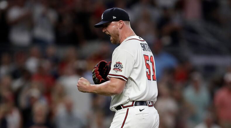Braves pitcher Will Smith reacts as the final out is made against the St. Louis Cardinals in the seventh inning of the second game of a doubleheader Sunday, June 20, 2021, at Truist Park in Atlanta. (Ben Margot/AP)