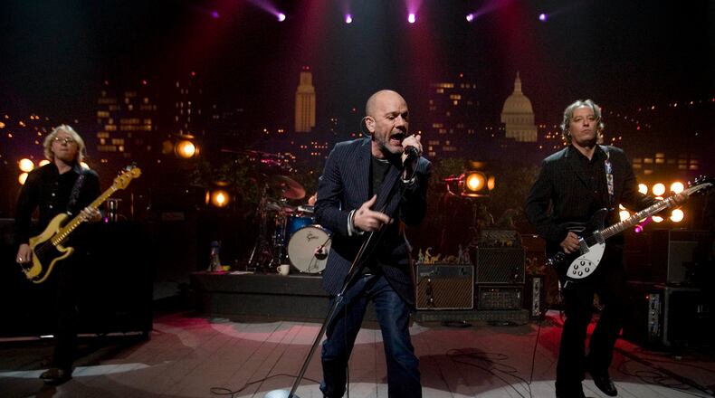 Left to right, Mike Mills, Michael Stipe and Peter Buck of R.E.M. perform on “Austin City Limits” on Thursday March 13, 2008. Stipe has been a vocal opponent of Georgia’s “campus carry” legislation.