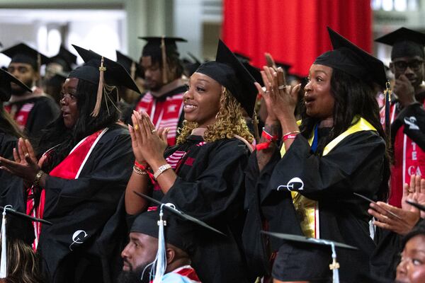Graduates clap as they are recognized at the Clark Atlanta University graduation ceremony at Georgia World Congress Center in Atlanta on May 18, 2026. About 75% of their students are women, a statistic similar to many HBCUs. (Arvin Temkar/AJC)