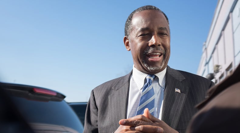 Republican presidential candidate Ben Carson speaks to reporters after stopping at The Airport Diner on February 7, 2016 in Manchester, New Hampshire. (Photo by Matthew Cavanaugh/Getty Images)