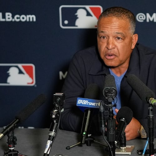 Dave Roberts, manager of the Los Angeles Dodgers, answers questions during a news conference at the MLB winter meetings, Monday, Dec. 8, 2025, in Orlando, Fla. (AP Photo/John Raoux)