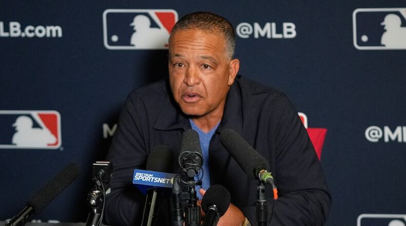 Dave Roberts, manager of the Los Angeles Dodgers, answers questions during a news conference at the MLB winter meetings, Monday, Dec. 8, 2025, in Orlando, Fla. (AP Photo/John Raoux)