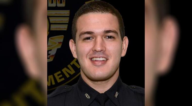 Kevin Valencia, an Orlando police officer who was shot in the head during a deadly standoff at an apartment complex, is now breathing on his own, sources say.