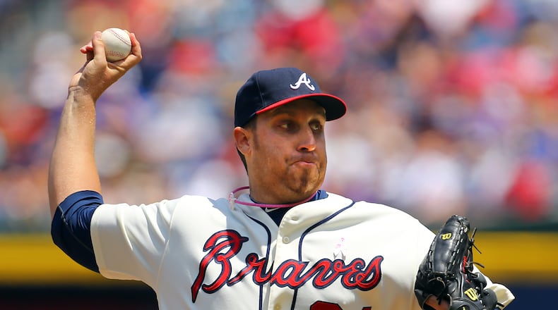 Aaron Harang delivers a pitch against the Cubs during the first inning of their MLB game on Sunday, May 11, 2014, in Atlanta. CURTIS COMPTON / CCOMPTON@AJC.COM