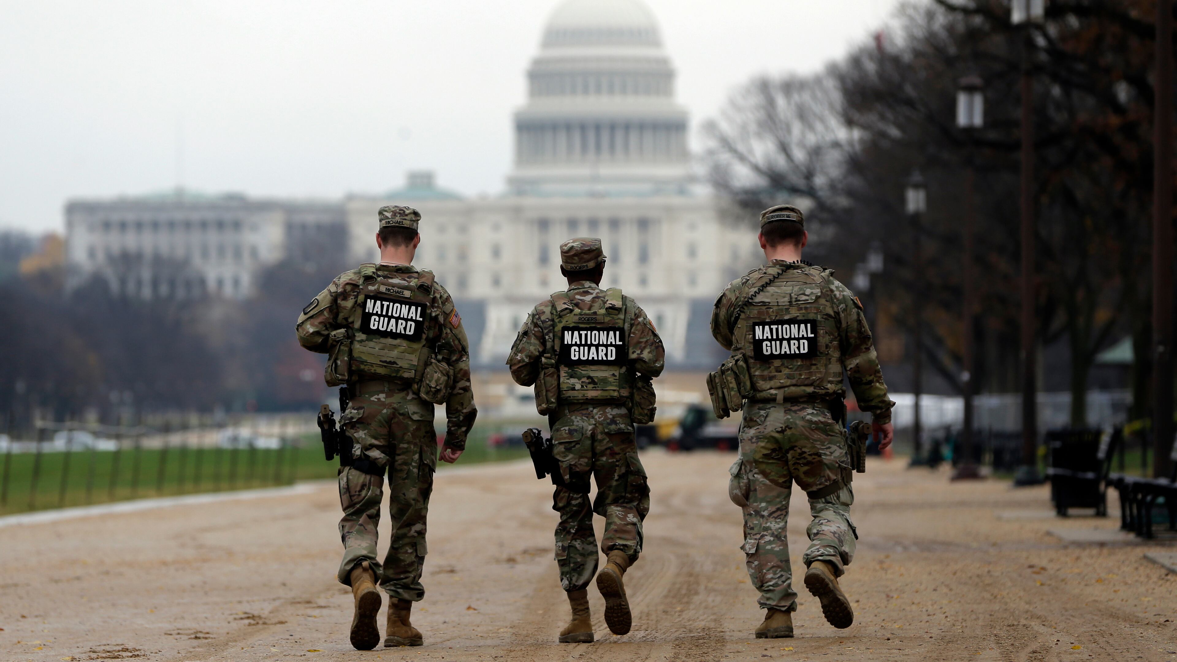 National Guard patrol along the National Mall in front of the Capitol, Wednesday, Nov. 26, 2025, in Washington. (AP Photo/Rahmat Gul)