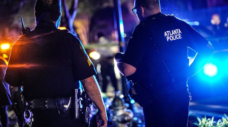 Atlanta police investigate a fatal shooting at a Buckhead apartment complex in May.