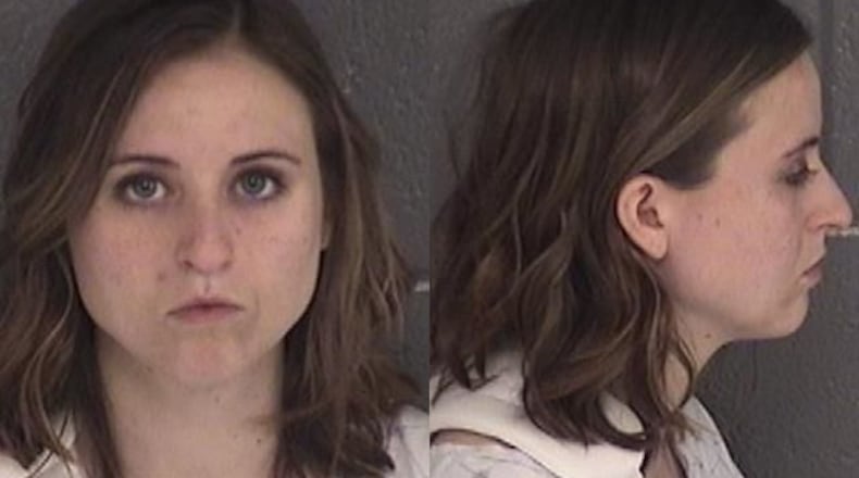 Police say Meghan Caldwell, of Loganville, ran a red light along Highway 316 in Barrow County, killing two people.