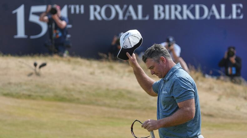 Ryan Fox of New Zealand acknowledges the crowd on the 188th green after completing his third round during the third day of the British Open Golf championships at Royal Birkdale golf club, in Southport, England, Saturday, July 18, 2026. (AP Photo/Jon Super)