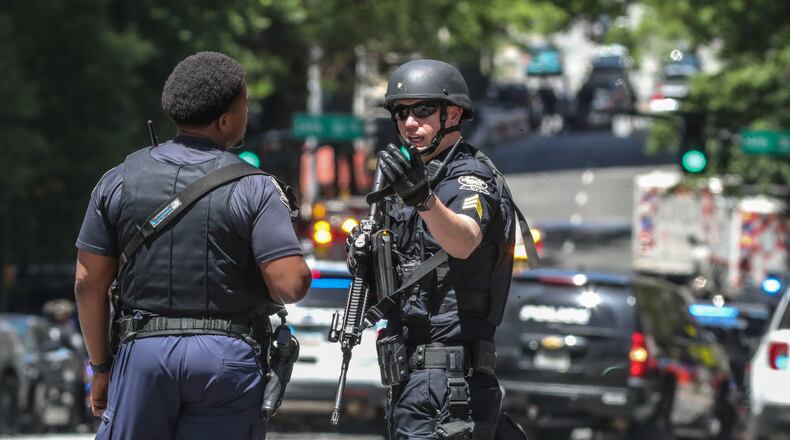 Atlanta police and a multi-jurisdictional force swarmed Midtown Atlanta on May 3 after five women were shot.