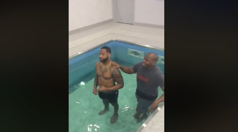 Dallas Cowboys team chaplain Jonathan Evans baptized three players at the team facility on Tuesday, Dec.5, 2017.
