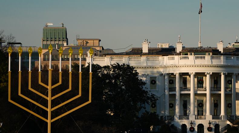 FILE - A large menorah stands in front of the White House on the third night of Hanukkah, Dec. 16, 2025, in Washington. (AP Photo/Julia Demaree Nikhinson, File)