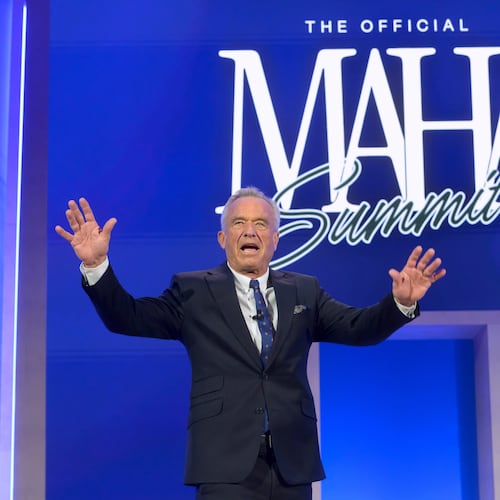 Health and Human Services Secretary Robert F. Kennedy, Jr., arrives on stage at the inaugural Make America Healthy Again summit at the Waldorf Astoria, Wednesday, Nov. 12, 2025, in Washington. (AP Photo/Rod Lamkey, Jr.)