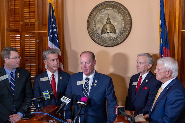 In March, Rep. Holt Persinger, R-Winder, (center) sponsored a school safety bill in the aftermath of the 2024 shooting at Apalachee High School. The bill would track and share behavioral health information about students. (Arvin Temkar/AJC)