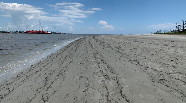 The Golden Ray has been beached on its side off St. Simons Island since Sept. 8, 2019, when the ship capsized shortly after leaving the Port of Brunswick. The vessel measures 656 feet long, and 4,200 automobiles remain inside its cargo decks. These photos were taken July 17, 2020, at Driftwood Beach on Jekyll Island's north end.