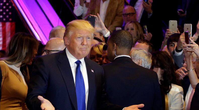 Republican presidential candidate Donald Trump gestures as he arrives to speak at a New York primary night campaign event, Tuesday, April 19, 2016, in New York. (AP Photo/Julie Jacobson)