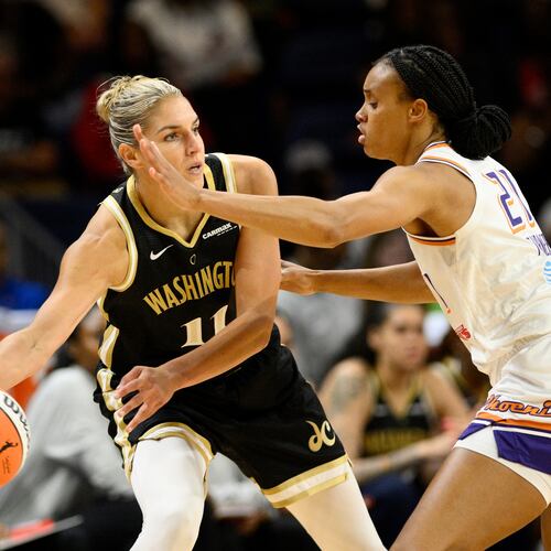 FILE - Washington Mystics forward Elena Delle Donne (11) looks to pass the ball as Phoenix Mercury forward Brianna Turner (21) defends during the first half of a WNBA basketball game, June 16, 2023, in Washington. (AP Photo/Nick Wass, File)