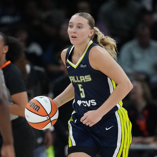 Dallas Wings guard Paige Bueckers (5) moves the ball up court against the Las Vegas Aces during the second half of a WNBA preseason basketball game in Austin, Texas, Sunday, May 3, 2026. (AP Photo/Eric Gay)
