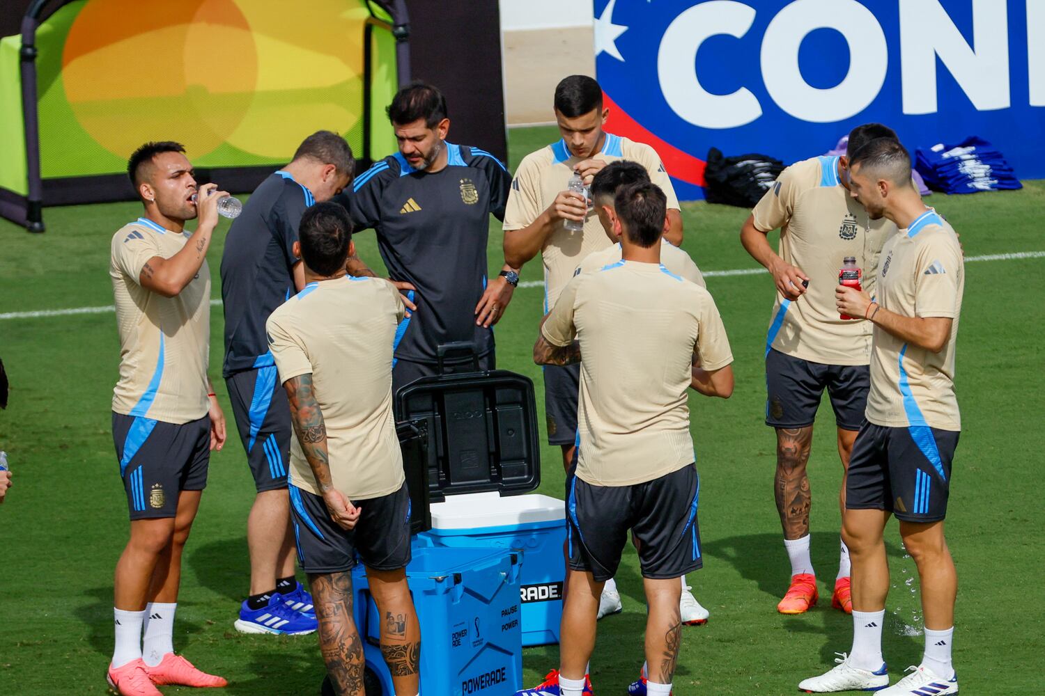 Argentina players take a break. 
(Miguel Martinez / AJC)
