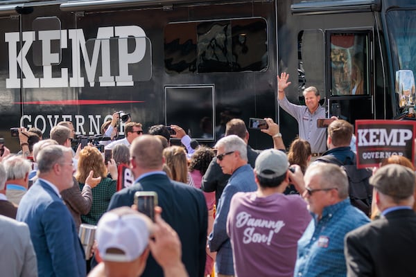 Gov. Brian Kemp greets supporters in Cumming at a rally featuring former Vice President Mike Pence on Tuesday, November 1, 2022. (Arvin Temkar / arvin.temkar@ajc.com)