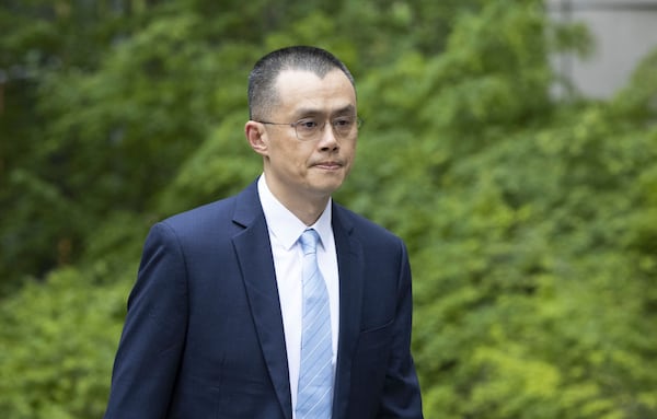 FILE - Changpeng Zhao, the founder of Binance, the world's largest cryptocurrency exchange, enters the Federal Courthouse in Seattle, April 30, 2024. (Ellen M. Banner/The Seattle Times via AP, File)