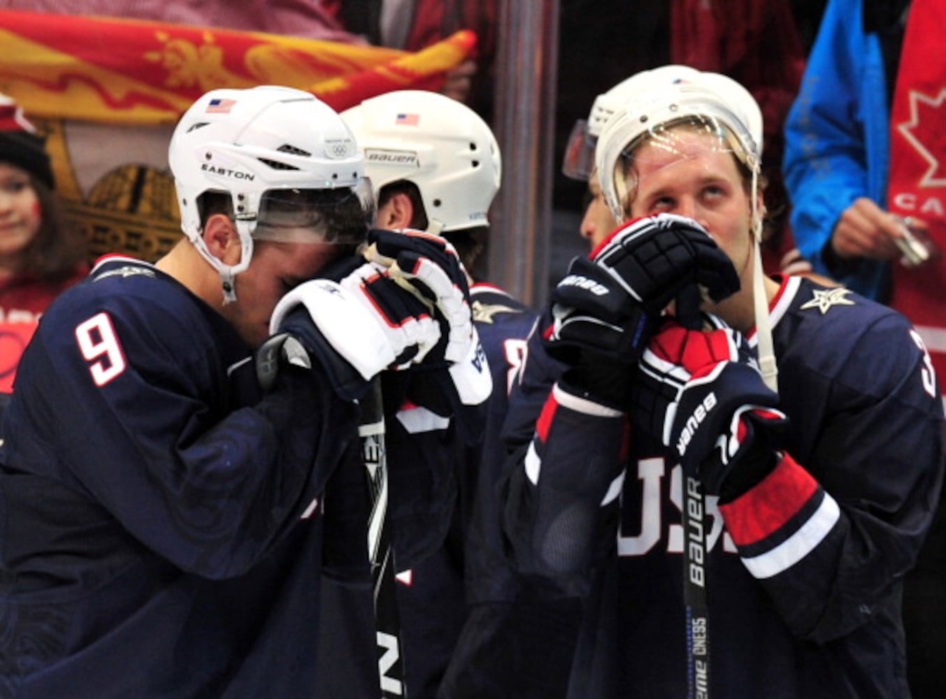 USA's forward Zach Parise (9) and a tea