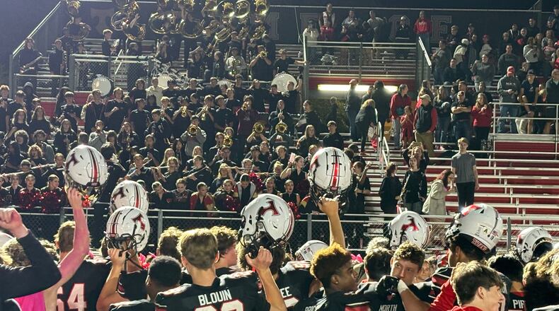 North Oconee players celebrate their 40-35 win over Eastside on Oct. 12, 2024.