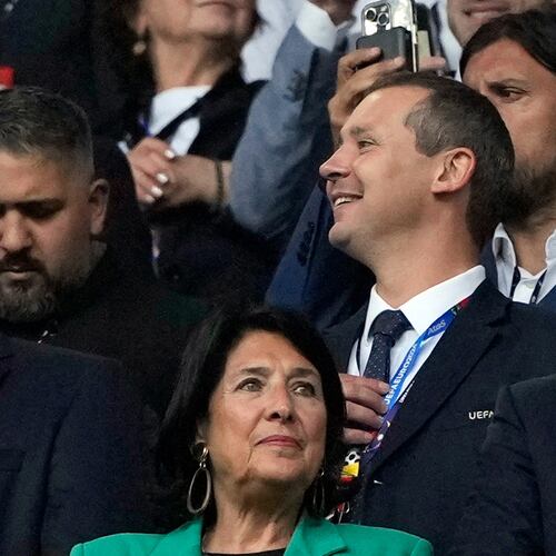 FILE - UEFA's deputy general secretary Kevin Lamour, centre, looks on as he stands next to UEFA President Aleksander Ceferin, right, prior to the start of a Group F match between Turkey and Georgia at the Euro 2024 soccer tournament in Dortmund, Germany, Tuesday, June 18, 2024. K(AP Photo/Alessandra Tarantino, File)