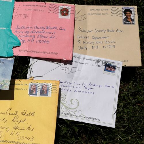 Pen pal letters are displayed outside the Sullivan County Health Care nursing home in Unity, N.H., June 8, 2020. (AP Photo/Charles Krupa, File)