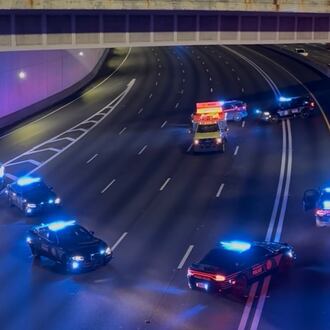 Atlanta police and a Georgia Department of Transportation HERO unit shut down I-75/I-85 North at Spring Street after a person was hit and killed early Thursday, Aug. 27, 2026. (Doug Turnbull for the AJC)