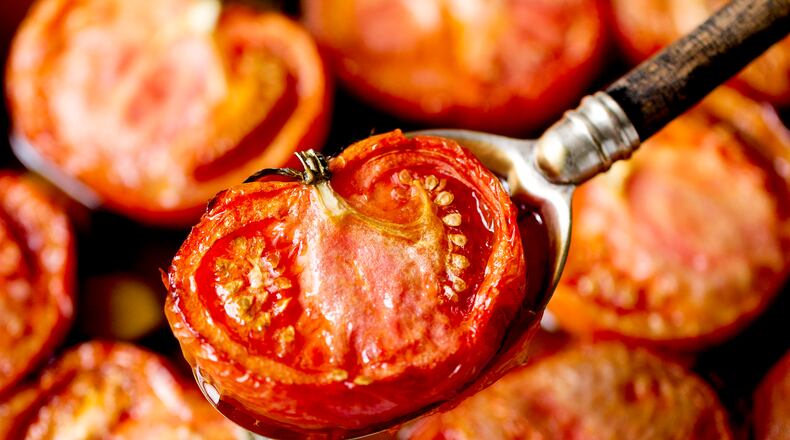 Tomato confit, tomatoes roasted in olive oil, in New York, Jan. 12, 2016. Tomatoes don’t have to be grown locally or eaten in season to taste good, they just have to be approached in the right way.