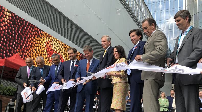 Dignitaries including Gov. Brian Kemp, Georgia Tech President G.P. “Bud” Peterson and Invest Atlanta CEO Eloisa Klementich cut the ribbon at the opening ceremony for Coda at Technology Square in Midtown. J. SCOTT TRUBEY@AJC.COM