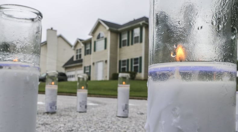 May 31, 2018 DeKalb County: Candles burning Thursday morning after a vigil for murdered football standout, Trevon Richardson. Just days after he graduated from high school, Trevon Richardson, 18, became the first of six teens shot in four days in metro Atlanta. JOHN SPINK/JSPINK@AJC.COM