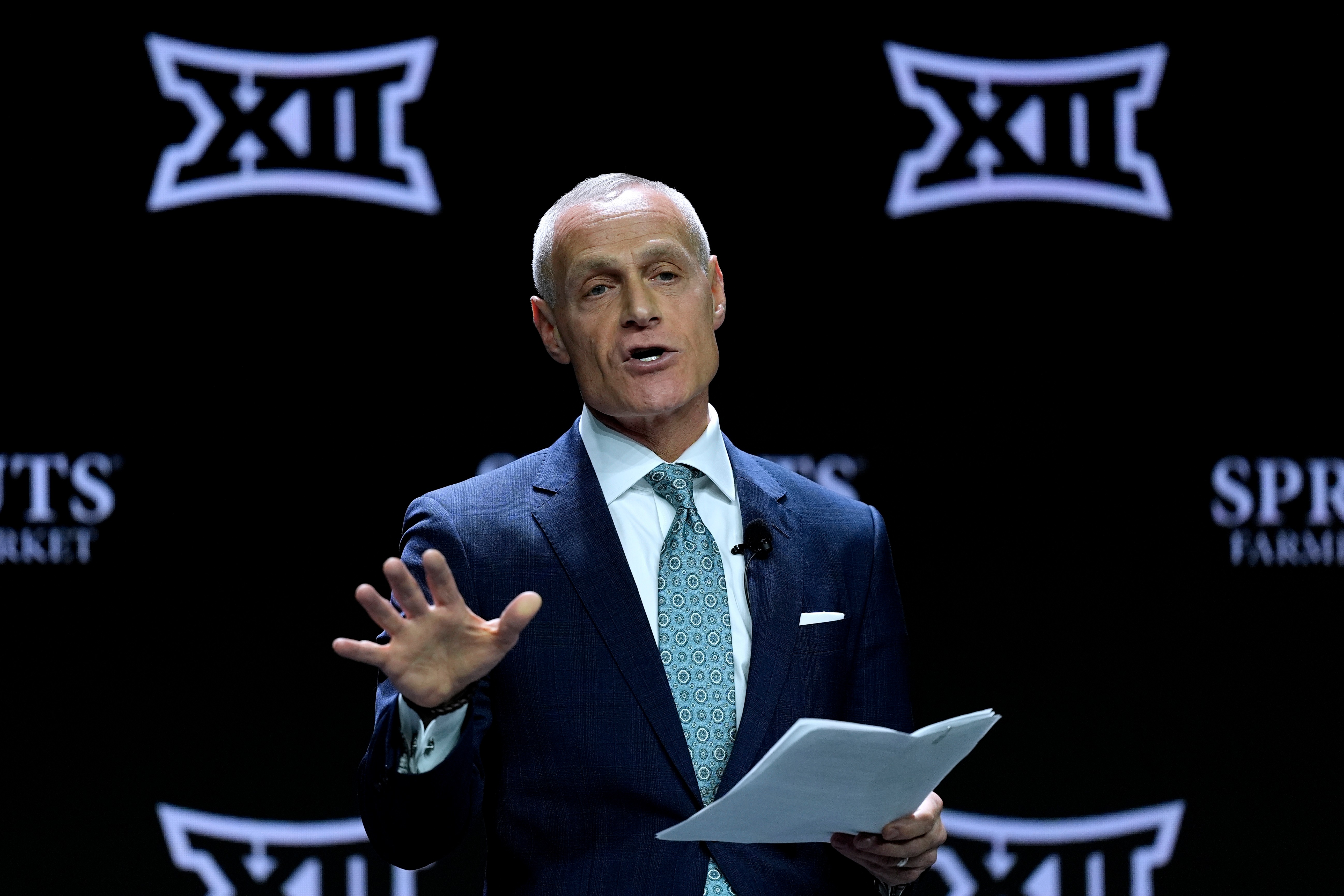 FILE - Big 12 Commissioner Brett Yormark addresses the media during the NCAA college Big 12 women's basketball media day, Oct. 22, 2024, in Kansas City, Mo. (AP Photo/Charlie Riedel, File)