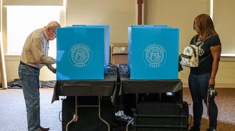 Voters cast their ballots at LV First United Methodist Church in Lawrenceville. PHIL SKINNER FOR THE ATLANTA JOURNAL-CONSTITUTION