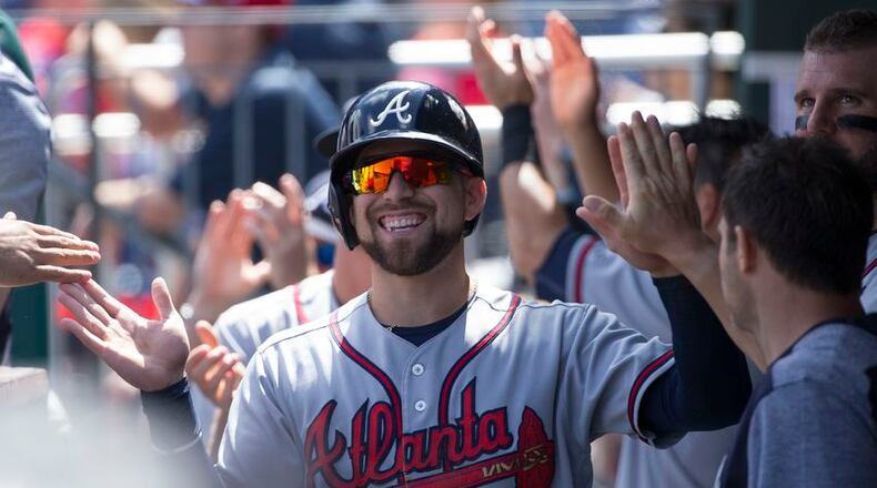 Ender Inciarte went 5-for-5 with a triple, a walk and four RBIs in the Braves’ 9-1 win Wednesday at Philadelphia. Here he’s congratulated after scoring the first run of the game in the first inning. (Photo by Mitchell Leff/Getty Images)